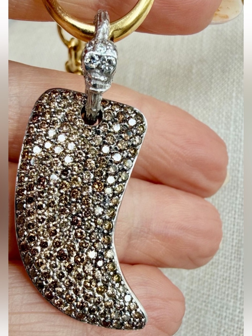 18k gold skull and tooth in diamonds